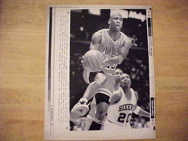 WIREPHOTO: Michael Jordan - [01/09/91] 'Michael Soars' (Bulls) Baseball cards value