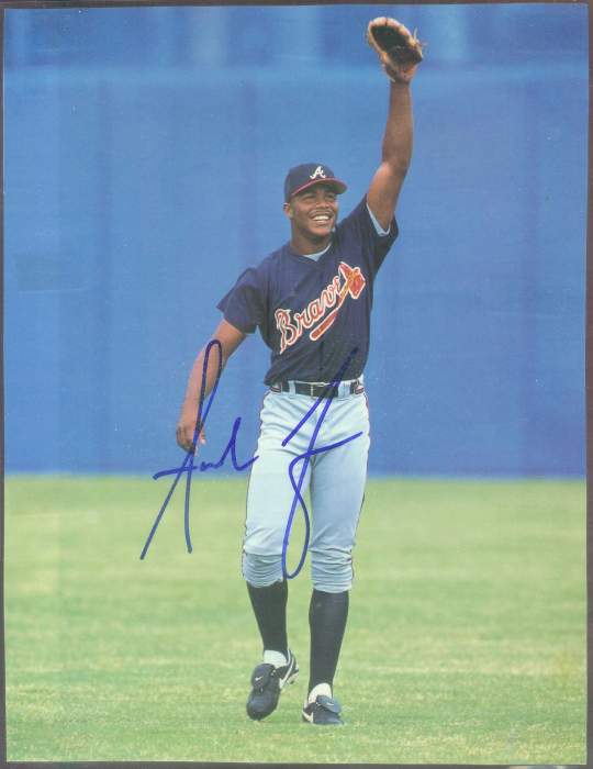  Andruw Jones - Autographed BLACK sig. 'Glove in Air' 7-1/2x10 Color Photo Baseball cards value