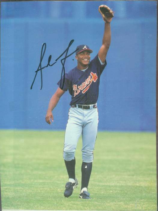  Andruw Jones - Autographed BLUE  sig. 'Glove in Air' 7-1/2x10 Color Photo Baseball cards value