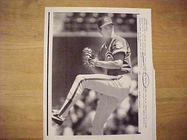 WIREPHOTO: Greg Maddux - [07/11/88] 'In The Bag!' (Cubs) Baseball cards value