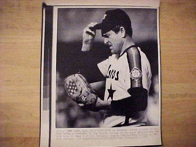 WIREPHOTO: Nolan Ryan - [10/14/86] 'Hard Work' (Astros) Baseball cards value