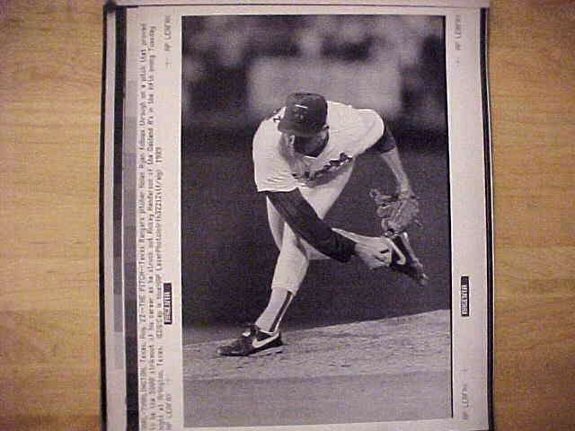 WIREPHOTO: Nolan Ryan - [08/22/89] 'The Pitch' (Ranger) Baseball cards value