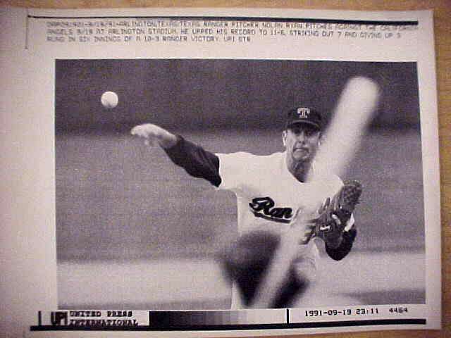 WIREPHOTO: Nolan Ryan - [09/19/91] 'From Here' (Rangers) Baseball cards value