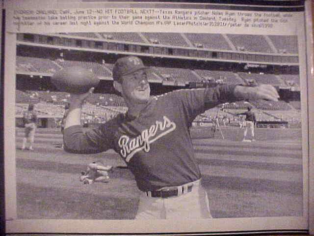 WIREPHOTO: Nolan Ryan - [06/12/90] 'No Hit Football Next?' (Rangers) Baseball cards value