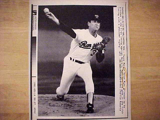 WIREPHOTO: Nolan Ryan - [05/13/91] 'Painful Experience' (Rangers) Baseball cards value