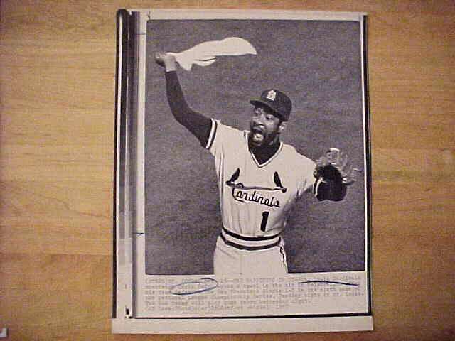 WIREPHOTO: Ozzie Smith - [10/13/87] 'The Happiness Of Oz' (Cardinals) Baseball cards value