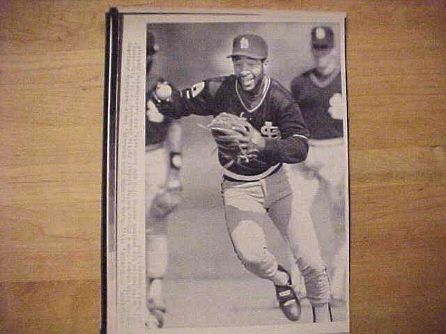 WIREPHOTO: Ozzie Smith - [03/02/88] 'Runs Them Down' (Cardinals) Baseball cards value
