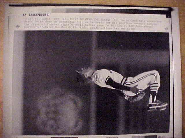 WIREPHOTO: Ozzie Smith - [10/22/85] 'Flipping Over The Series' (Cardinals) Baseball cards value