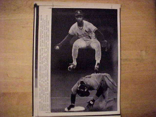 WIREPHOTO: Ozzie Smith - [05/05/87] 'Suspended In Space' (Cardinals) Baseball cards value