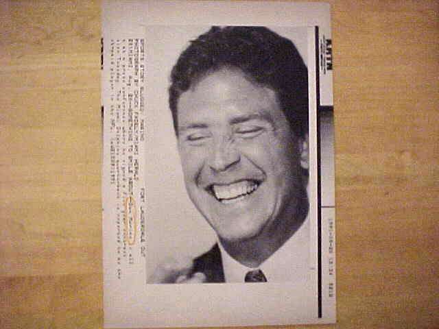 WIREPHOTO: Dan Marino - [08/20/91] 'Something To Smile About' (Dolphins) Baseball cards value