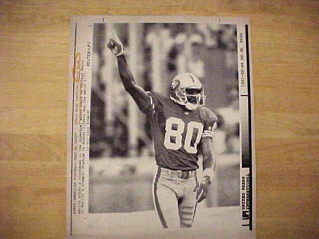 WIREPHOTO: Jerry Rice - [08/03/91] 'Overseas' (49ers) Baseball cards value