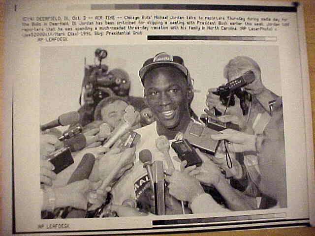 WIREPHOTO: Michael Jordan - [10/03/91] 'Air Time' (Bulls) Baseball cards value