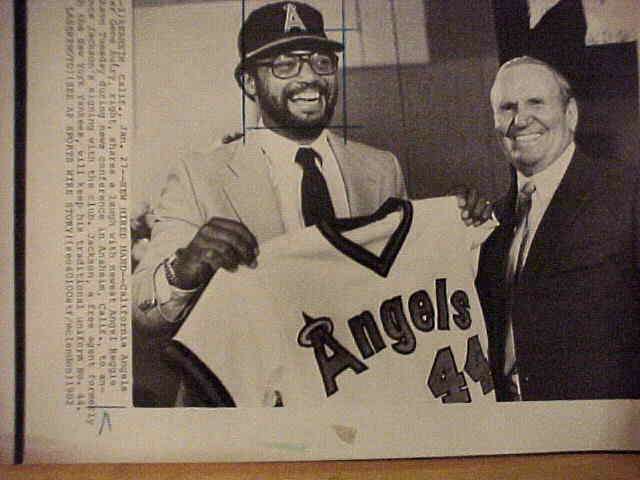 WIREPHOTO: Reggie Jackson - [01/27/82] 'New Hired Hand' (Angels) Baseball cards value