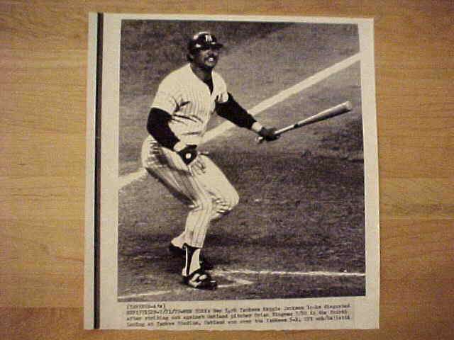 WIREPHOTO: Reggie Jackson - [07/21/79] 'Familiar Scene' (Yankees) Baseball cards value