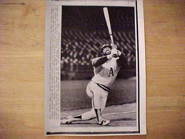WIREPHOTO: Reggie Jackson - [04/17/74] 'Reggie Jackson Hits Himself' (A's) Baseball cards value