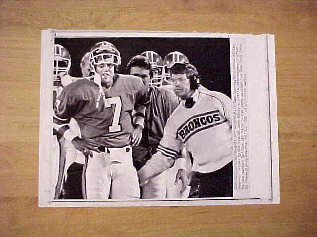 WIREPHOTO: John Elway - {10/20/86} 'It's Okay' (Broncos) Football cards value
