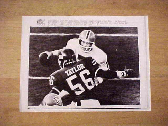 WIREPHOTO: John Elway - {01/25/87} 'Trapped' (Broncos) Football cards value