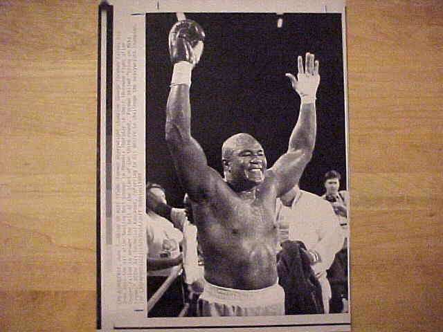 WIREPHOTO {Boxing}: George Foreman - {06/01/89} 'Bring On Mike Tyson' Boxing cards value