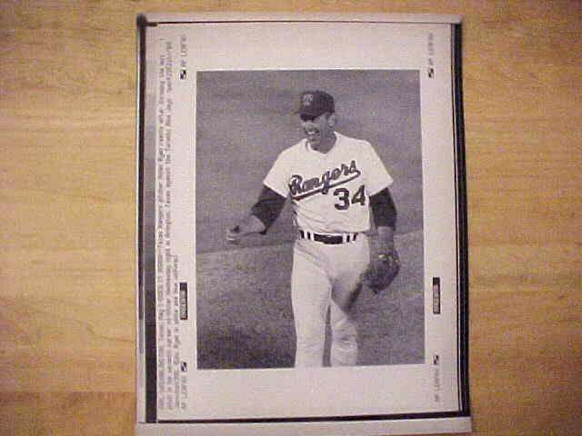 WIREPHOTO: Nolan Ryan - [05/01/91] 'Does It Again' (Rangers) Baseball cards value