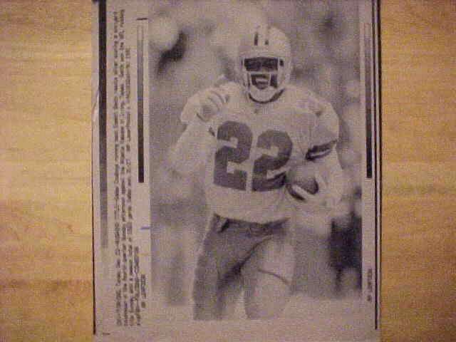 WIREPHOTO: Emmitt Smith - [12/22/91] 'Rushing Title' (Cowboys) Baseball cards value