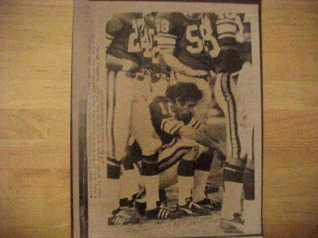 WIREPHOTO: Fran Tarkenton - [01/30/77] 'It's Over' (Vikings) Football cards value