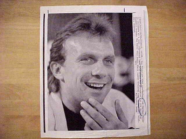 WIREPHOTO: Joe Montana - [07/14/88] 'A Happy Guy' (49ers) Football cards value