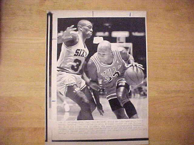 WIREPHOTO: Michael Jordan - [01/10/91] 'Michael Rolls On' (Bulls) Baseball cards value