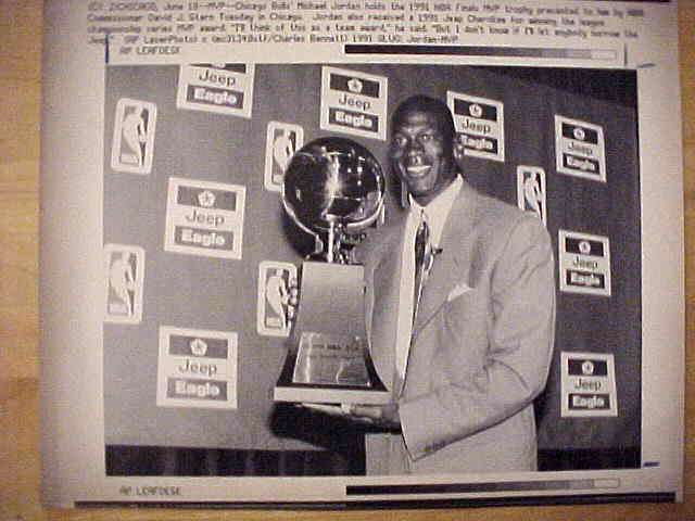 WIREPHOTO: Michael Jordan - [06/18/91] 'MVP' (Bulls) Baseball cards value