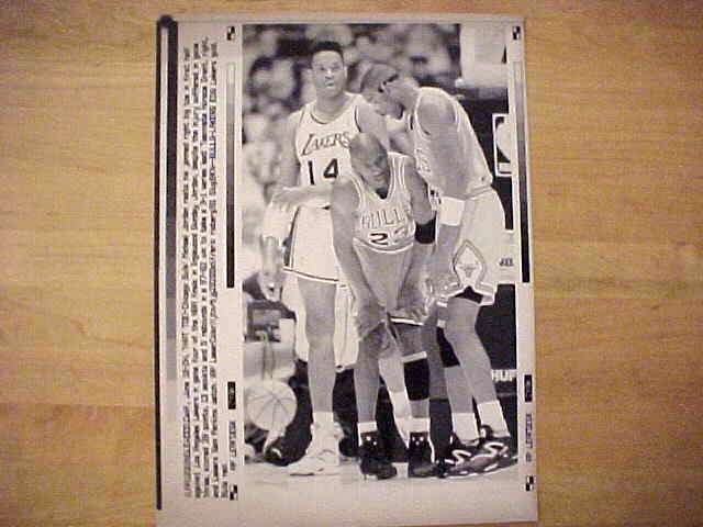 WIREPHOTO: Michael Jordan - [06/10/91] 'Oh, That Toe!' (Bulls) Baseball cards value