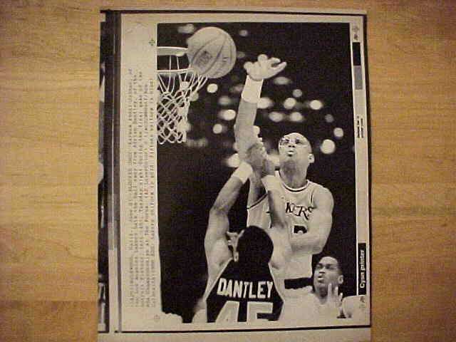 WIREPHOTO: Kareem Abdul-Jabbar - [02/03/76] 'It's Mine!' (Lakers) Basketball cards value