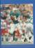 Dan Marino - Glossy Kodak 8x10 (Green jersey, ball at chest)