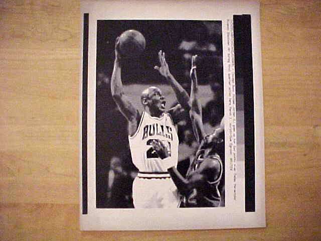 WIREPHOTO: Michael Jordan - [03/01/91] 'Up And Over' (Bulls) Basketball cards value