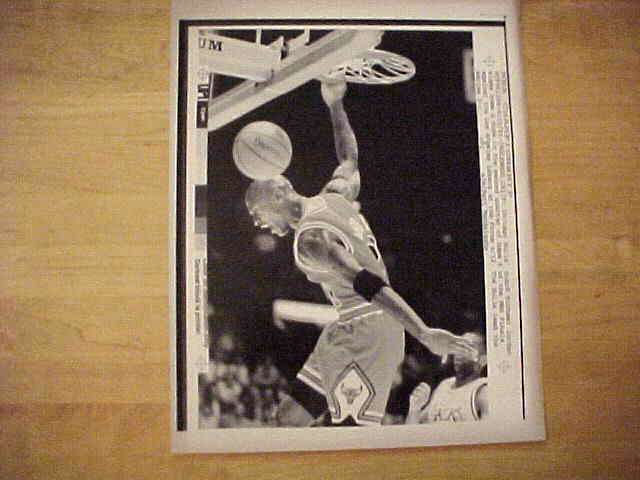 WIREPHOTO: Michael Jordan - [06/12/91] 'Through The Hoop' (Bulls) Basketball cards value