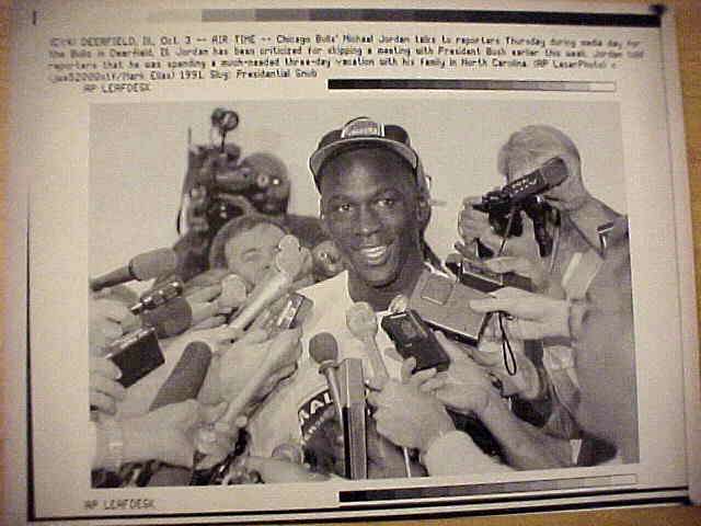 WIREPHOTO: Michael Jordan - [10/03/91] 'Air Time' (Bulls) Basketball cards value