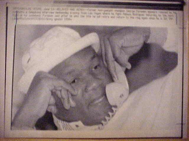WIREPHOTO [BOXING]: George Foreman - [06/13/90] 'Relaxed And Ready'  cards value